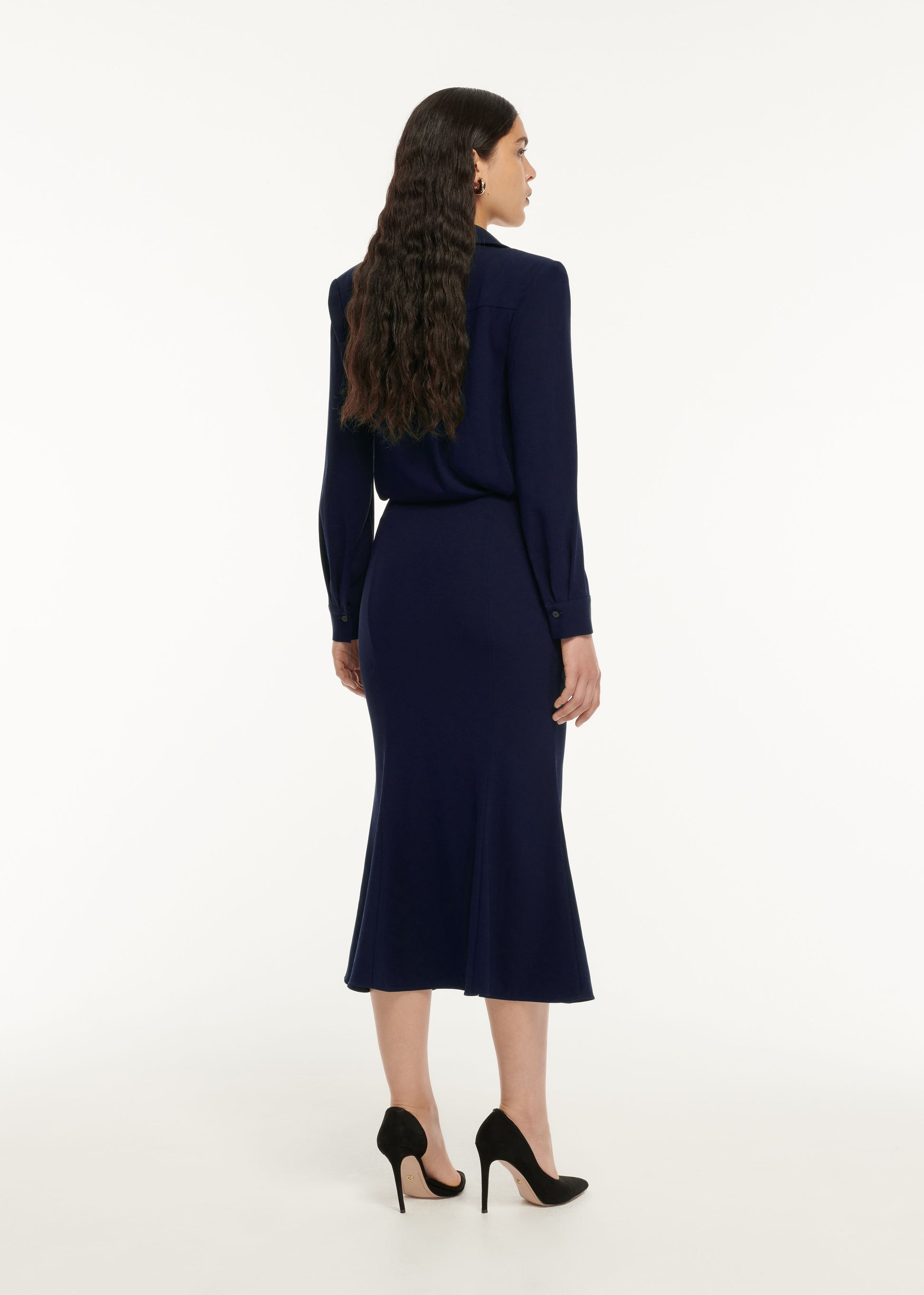 The back of a woman wearing the Long Sleeve Crepe Midi Dress