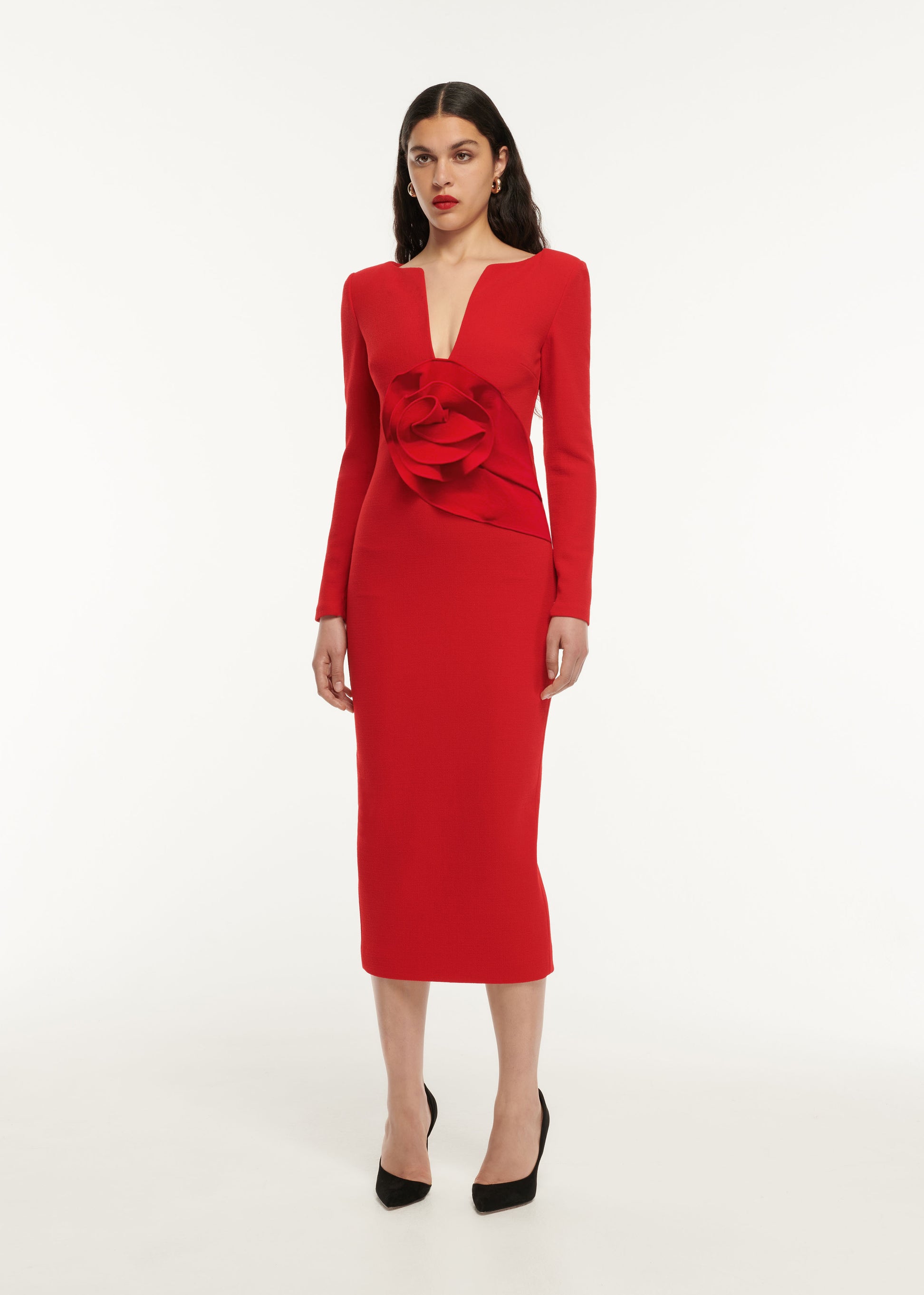 A woman wearing the Long Sleeve Wool Crepe Midi Dress in Red