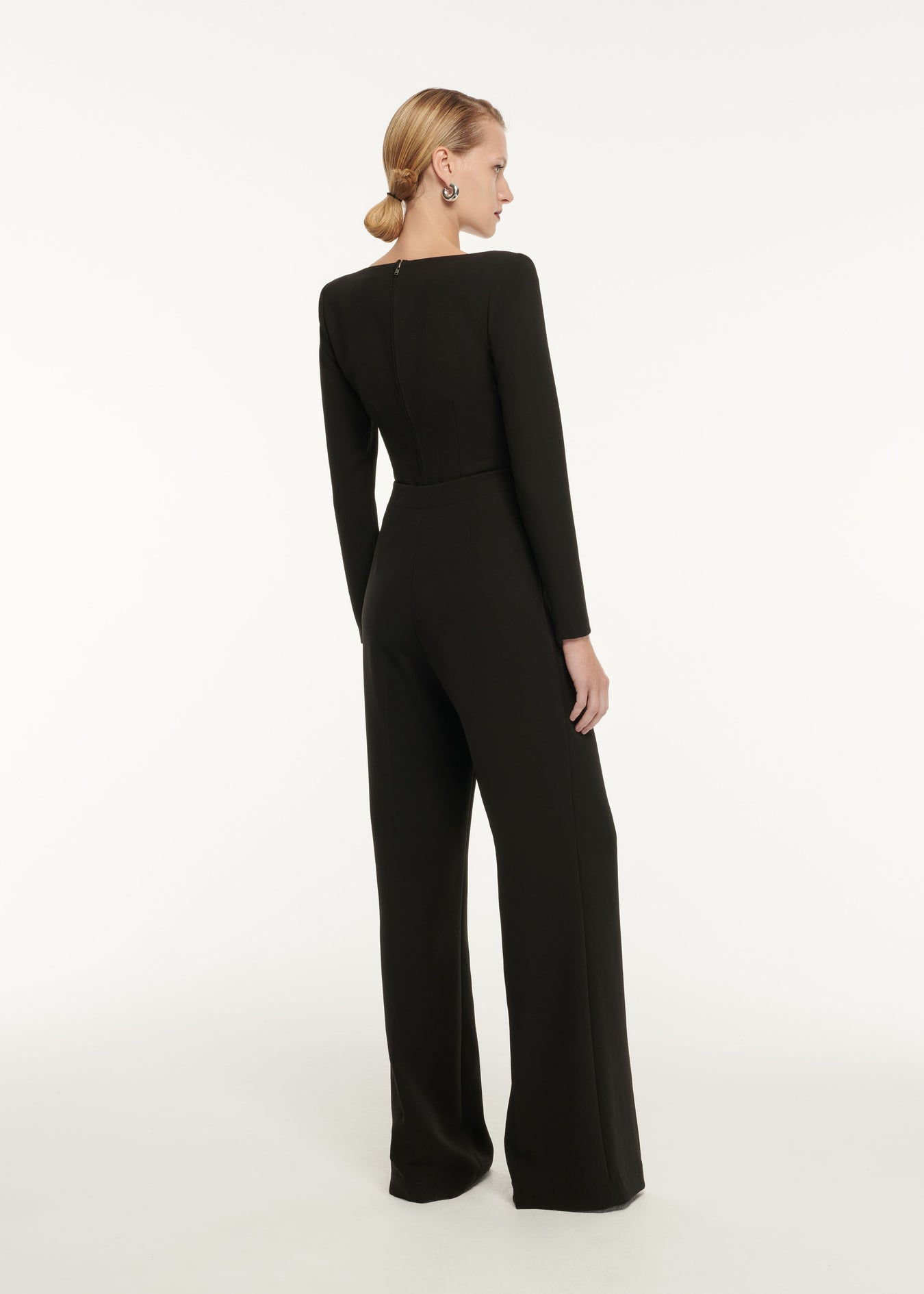 The back of a woman wearing the Wool Crepe Midi Dress Black