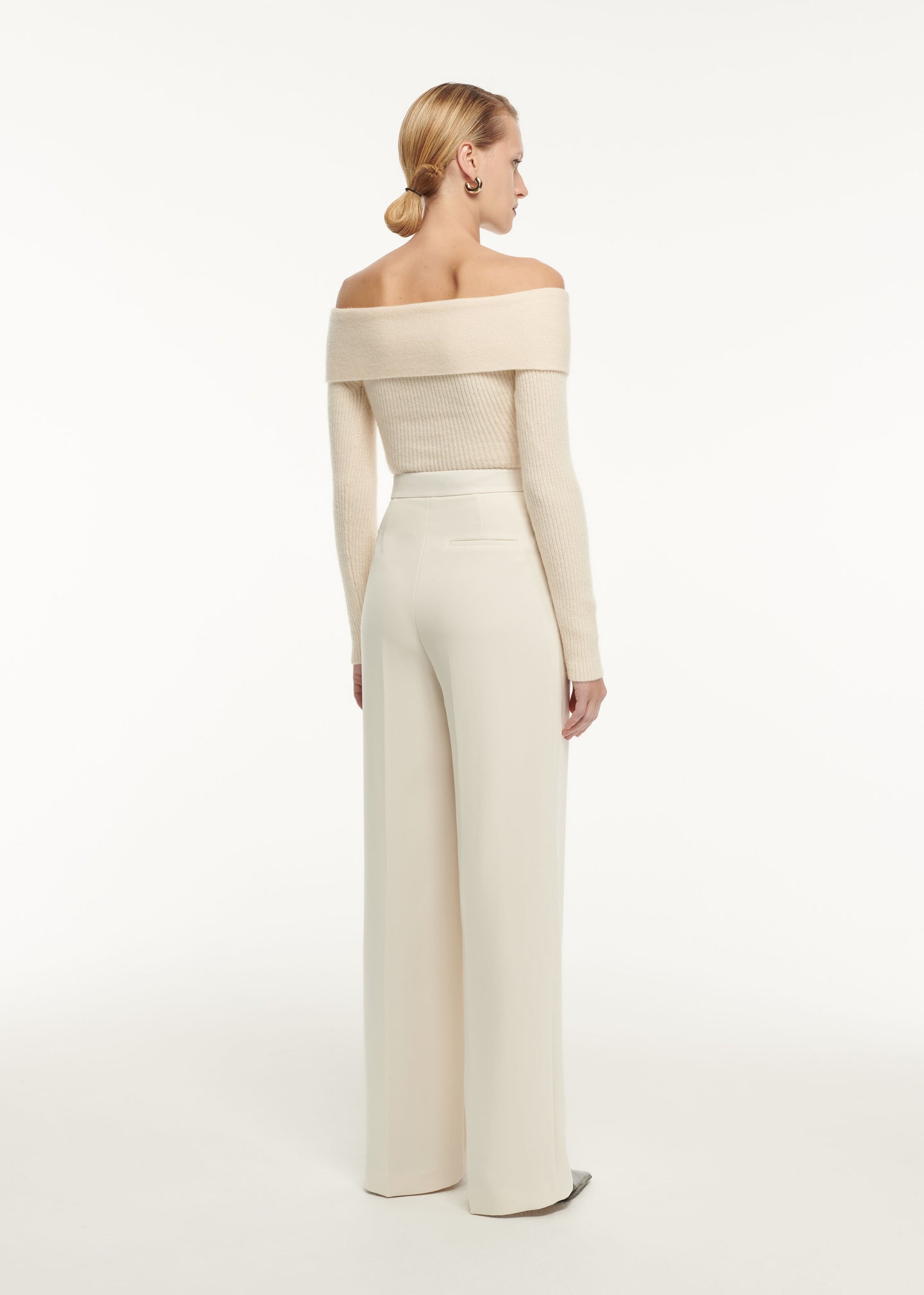 The back of a woman wearing the Long Sleeve Collar Satin Crepe Midi Dress
