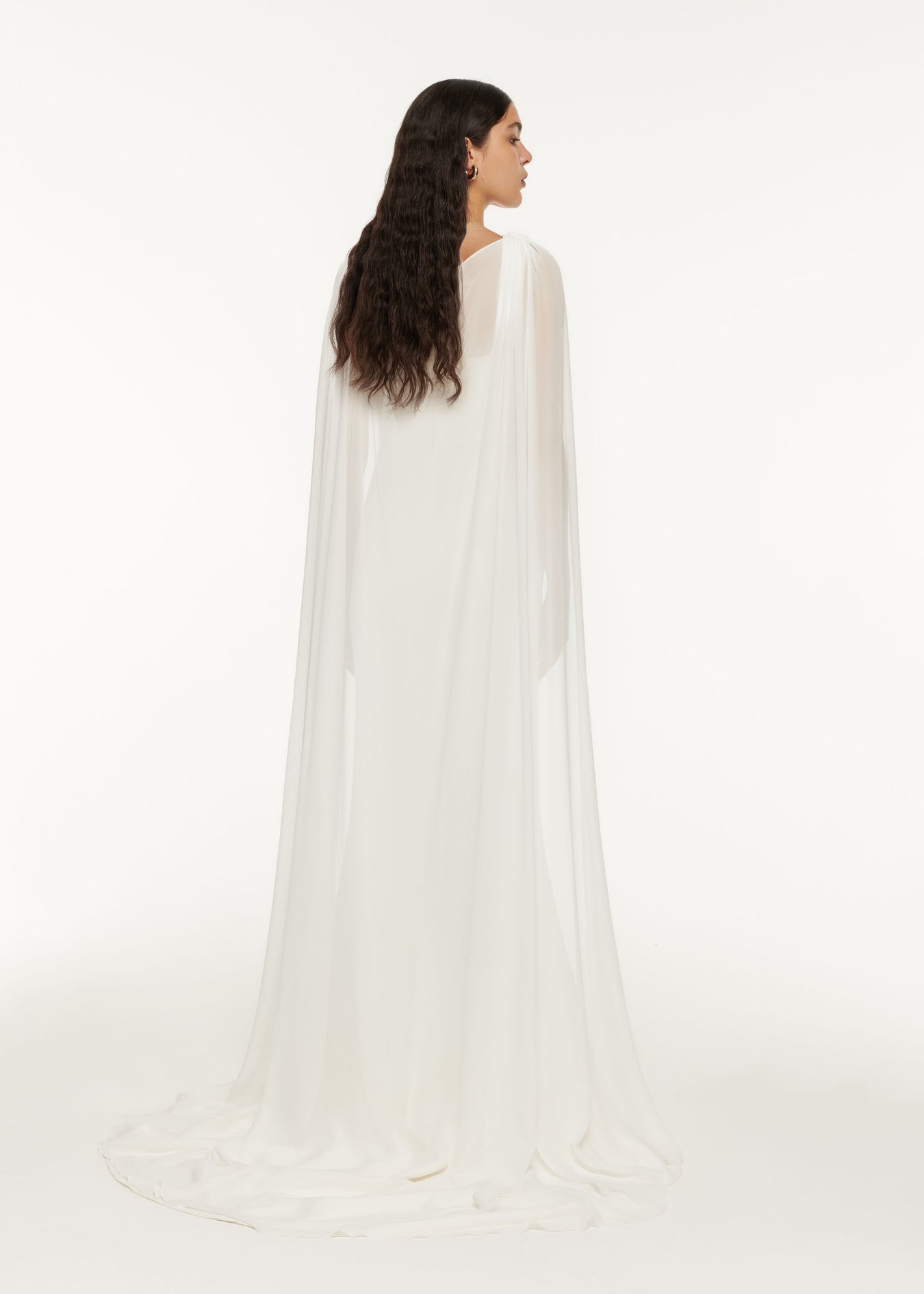 The back of a woman wearing the Stretch Cady Gown White