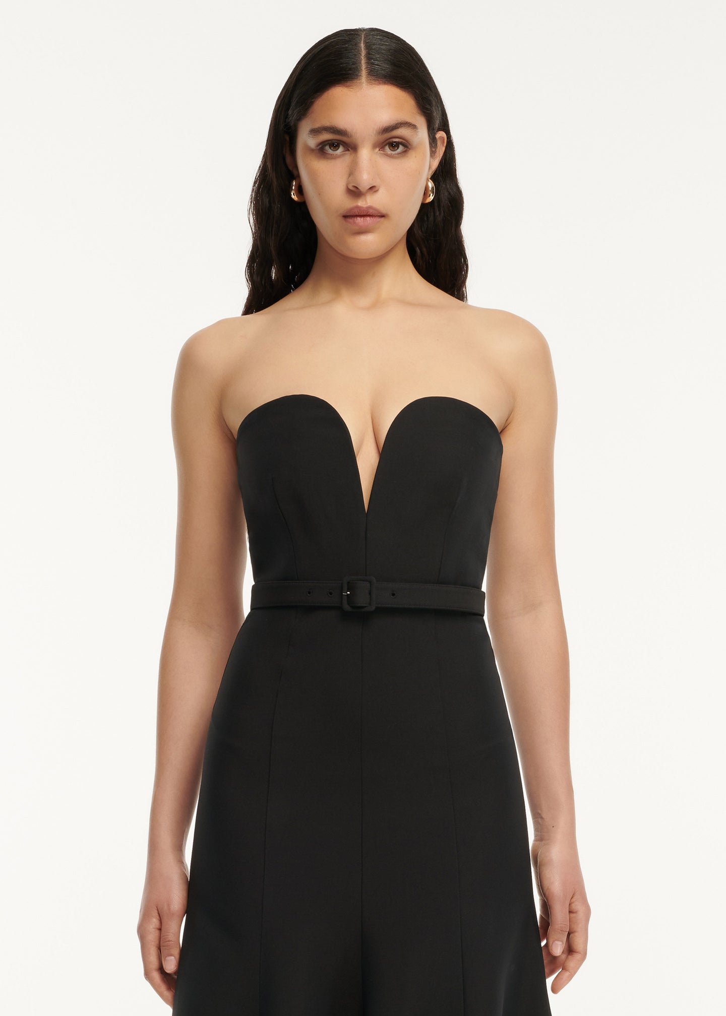 A close up of a woman wearing the Strapless Wool Silk Midi Dress Black