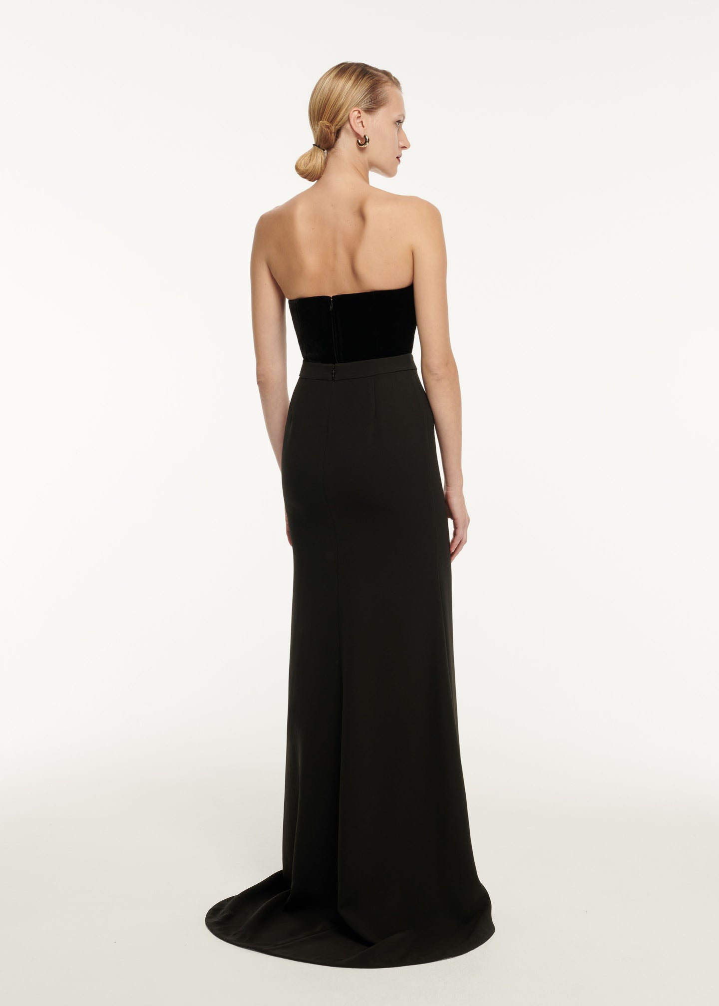 The back of a woman wearing the Cape Sleeve Stretch Cady Maxi Dress