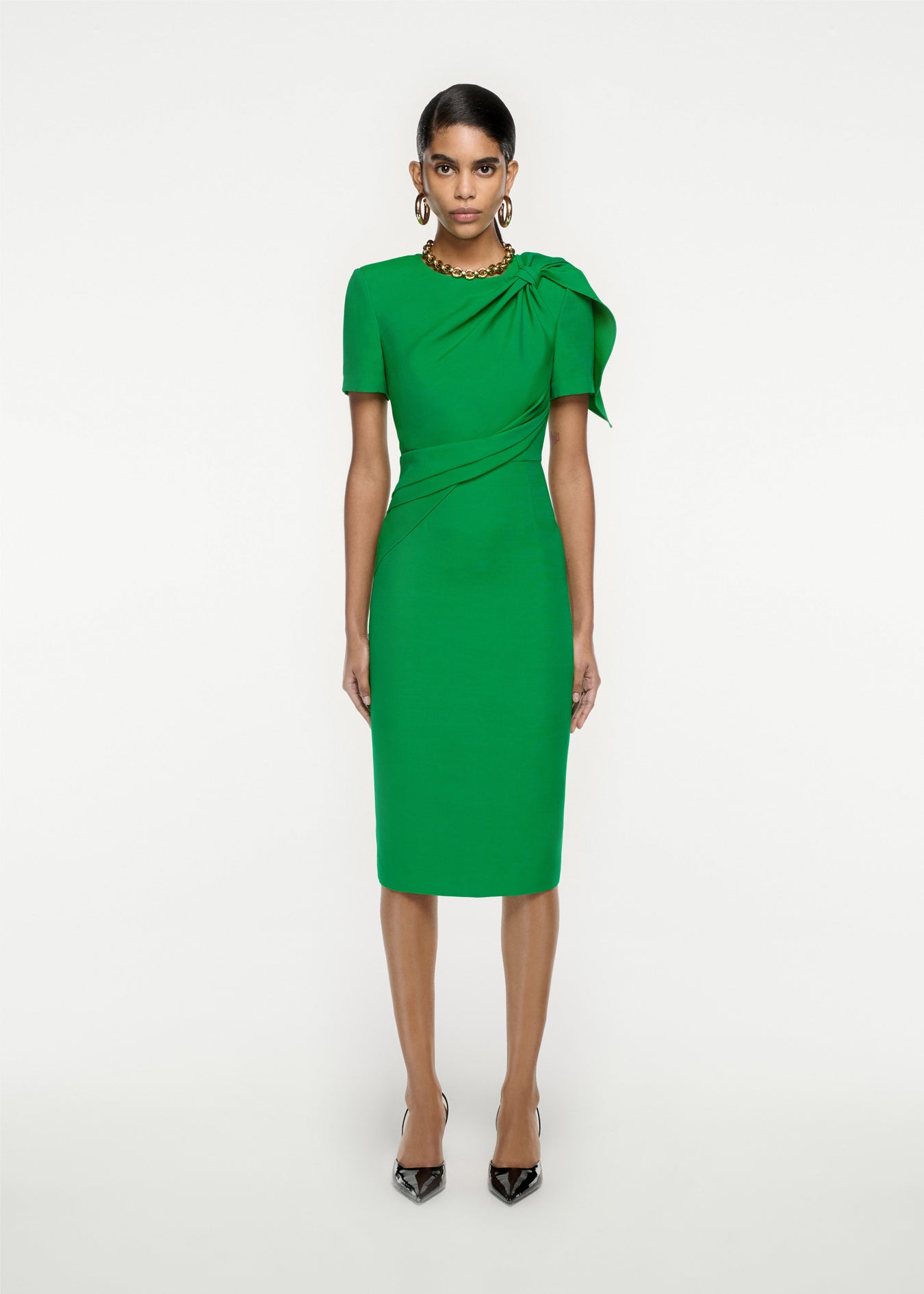 Woman wearing the Short Sleeve Silk Wool knot Midi Dress in Green