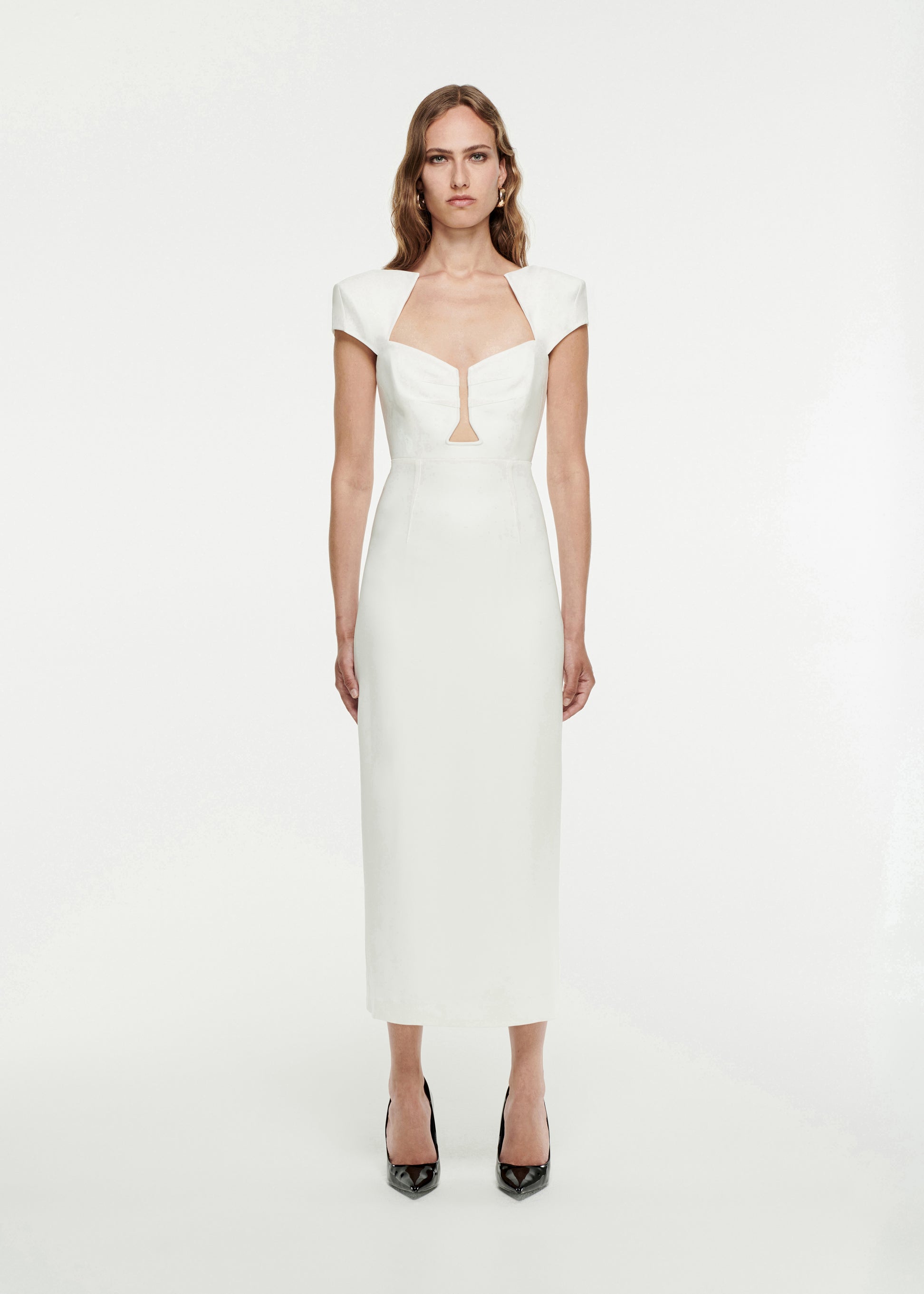 Woman wearing the Cap Sleeve Stretch-Cady Midi Dress in White 