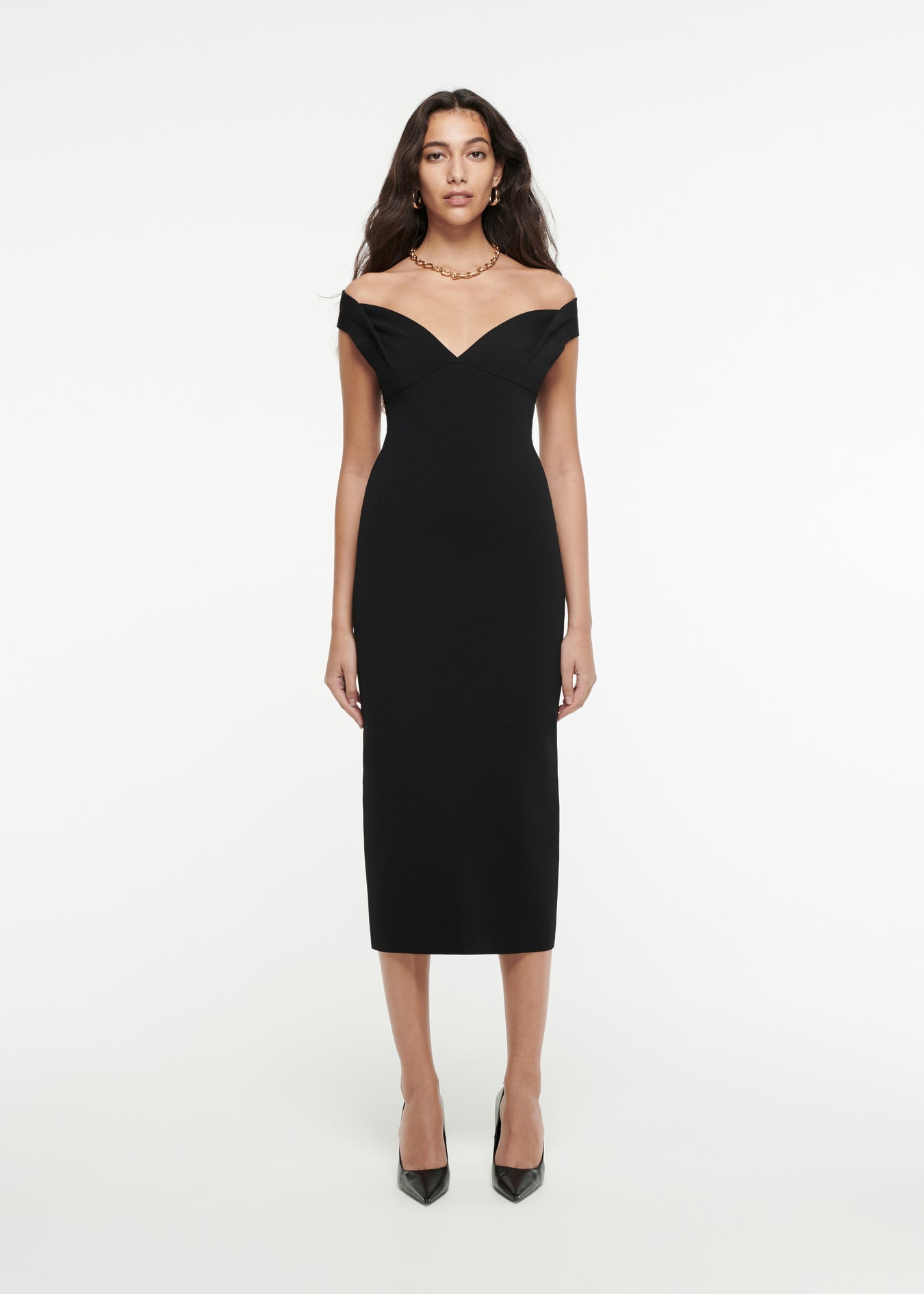 Woman wearing the Off-The-Shoulder Knit Midi Dress in Black 