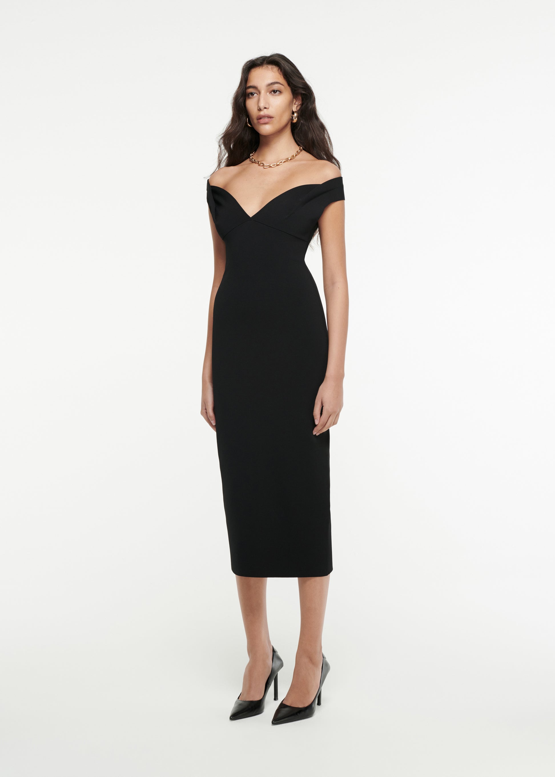 Woman wearing the Off-The-Shoulder Knit Midi Dress in Black 