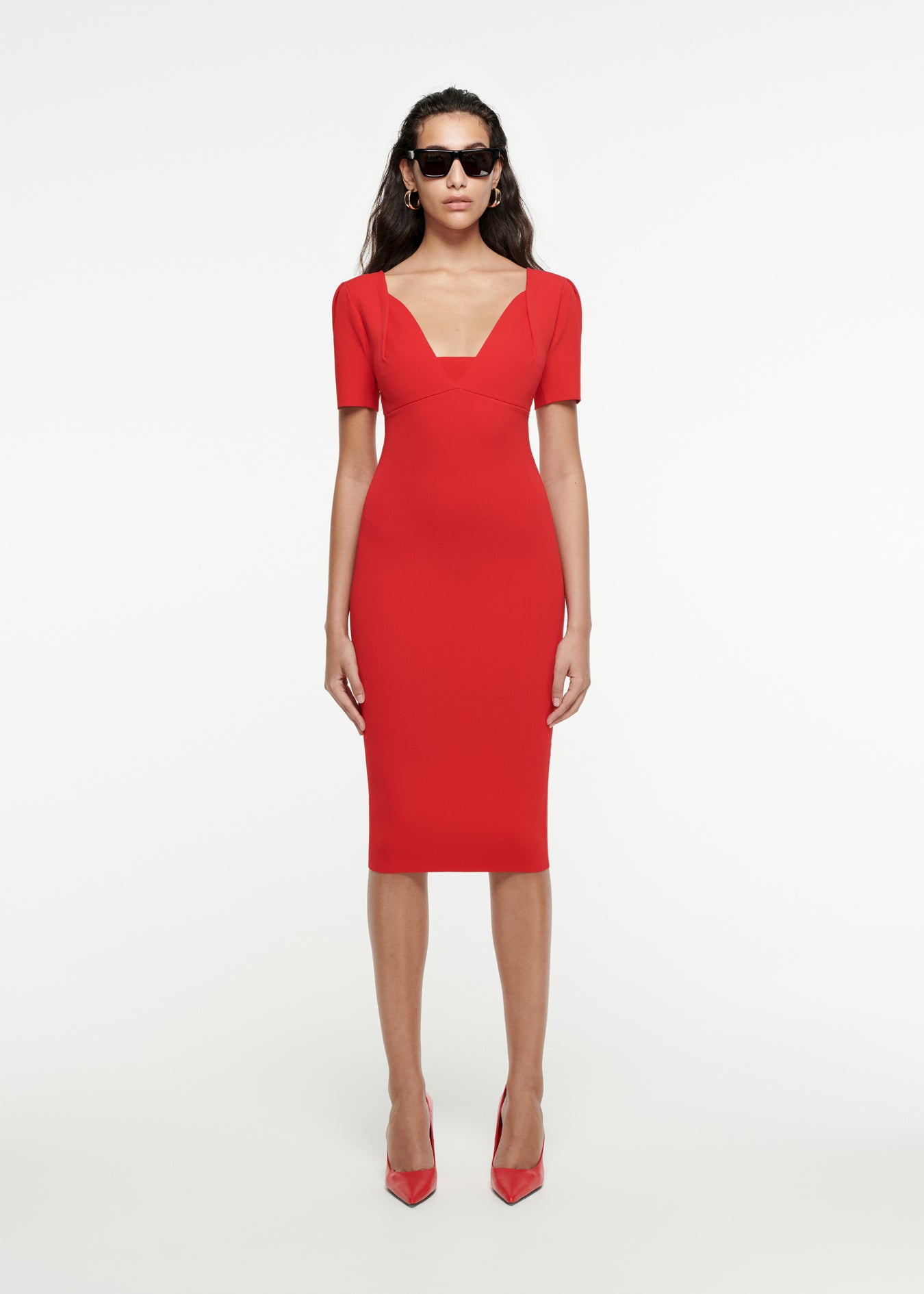 Woman wearing the Short Sleeve Knit Midi Dress in Red
