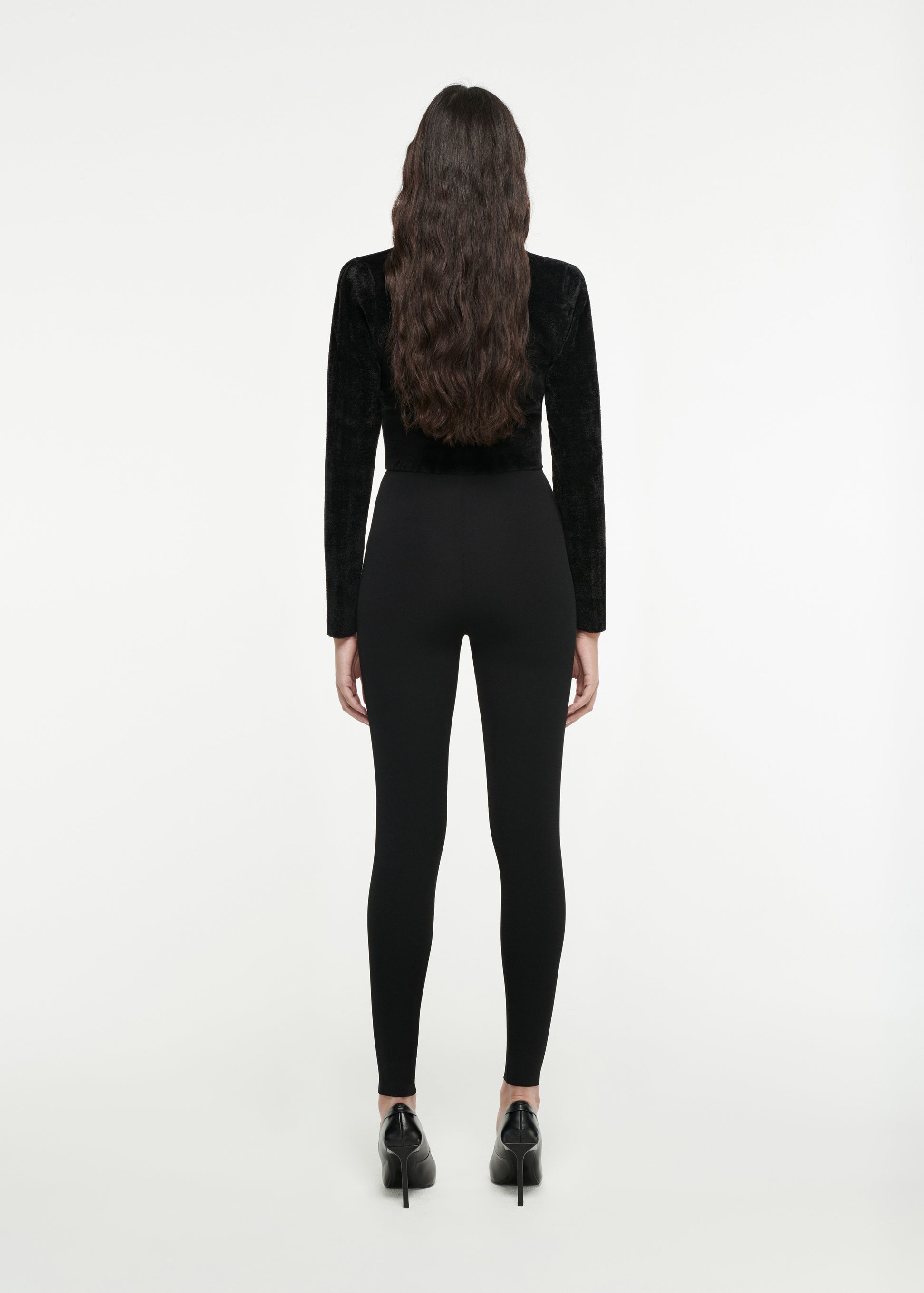 The back of a woman wearing the High-Waisted Leggings in Black