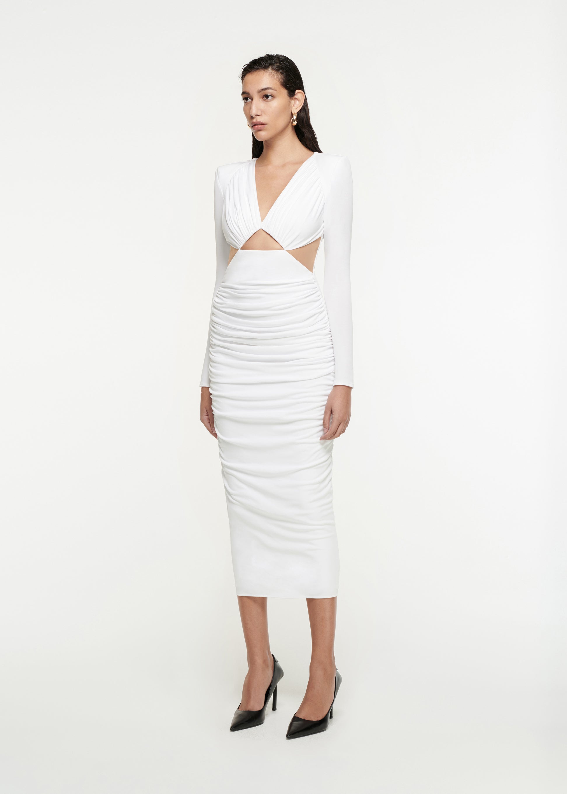 Woman wearing the Long Sleeve Jersey Midi Dress in White