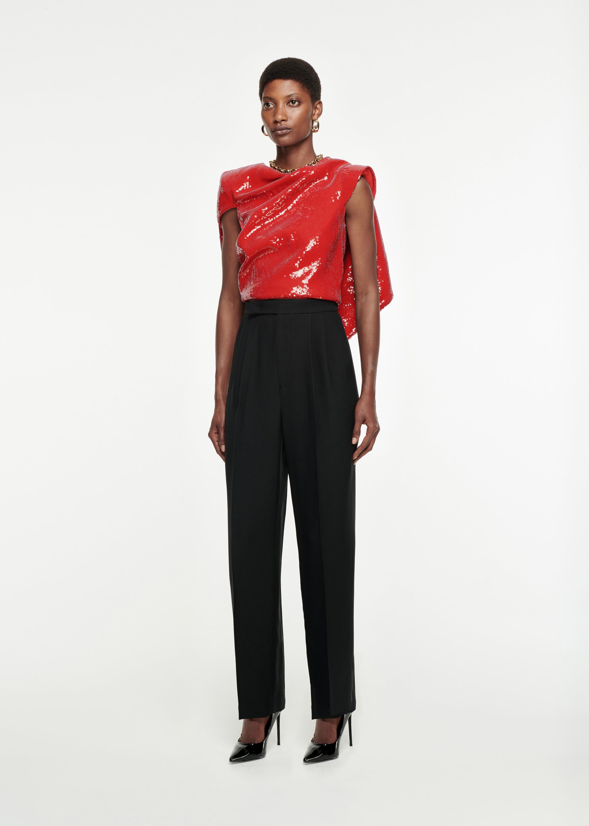 Woman wearing the Draped Sequin Top in Red