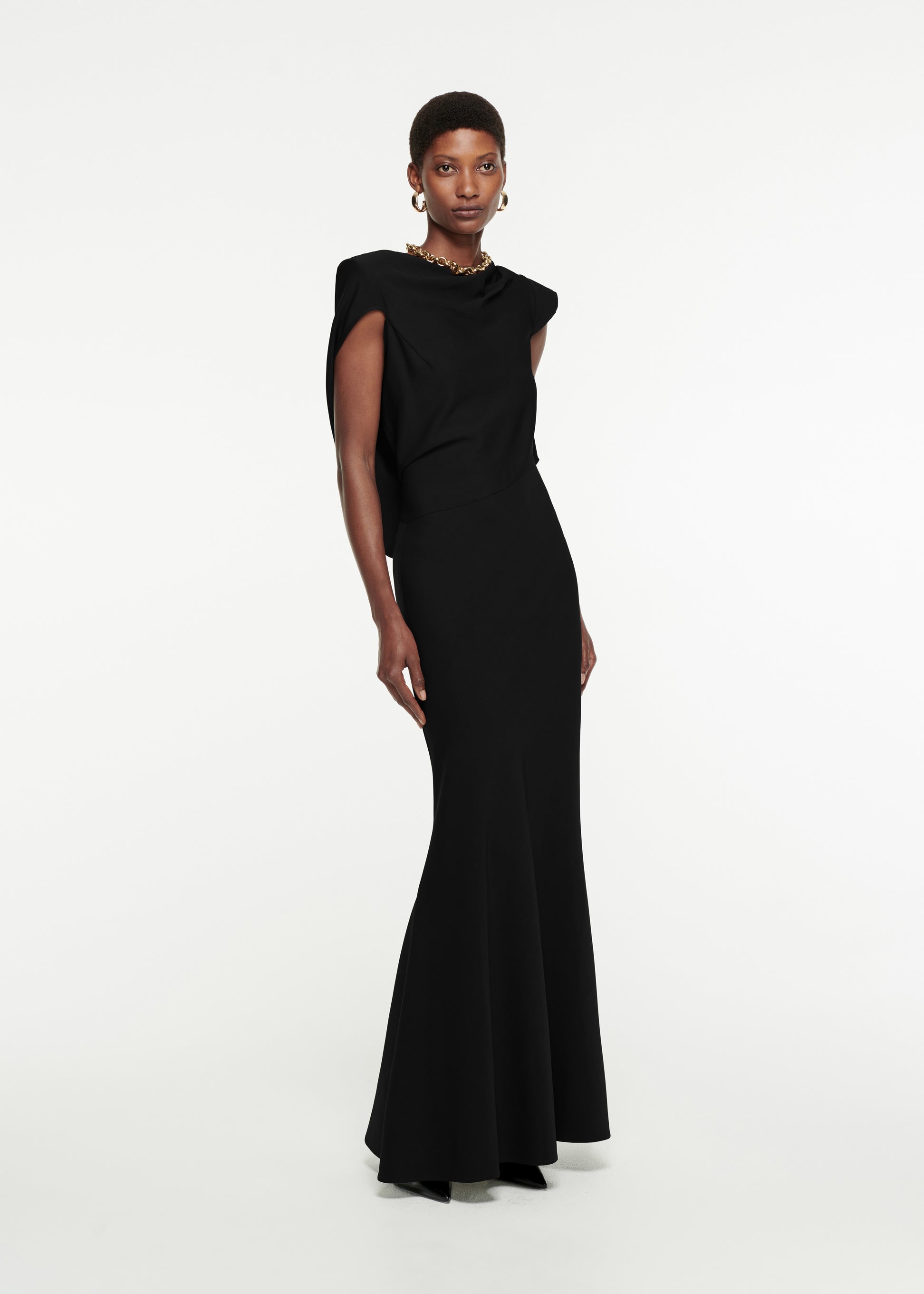 Woman wearing the Draped Stretch-Cady Gown in Black