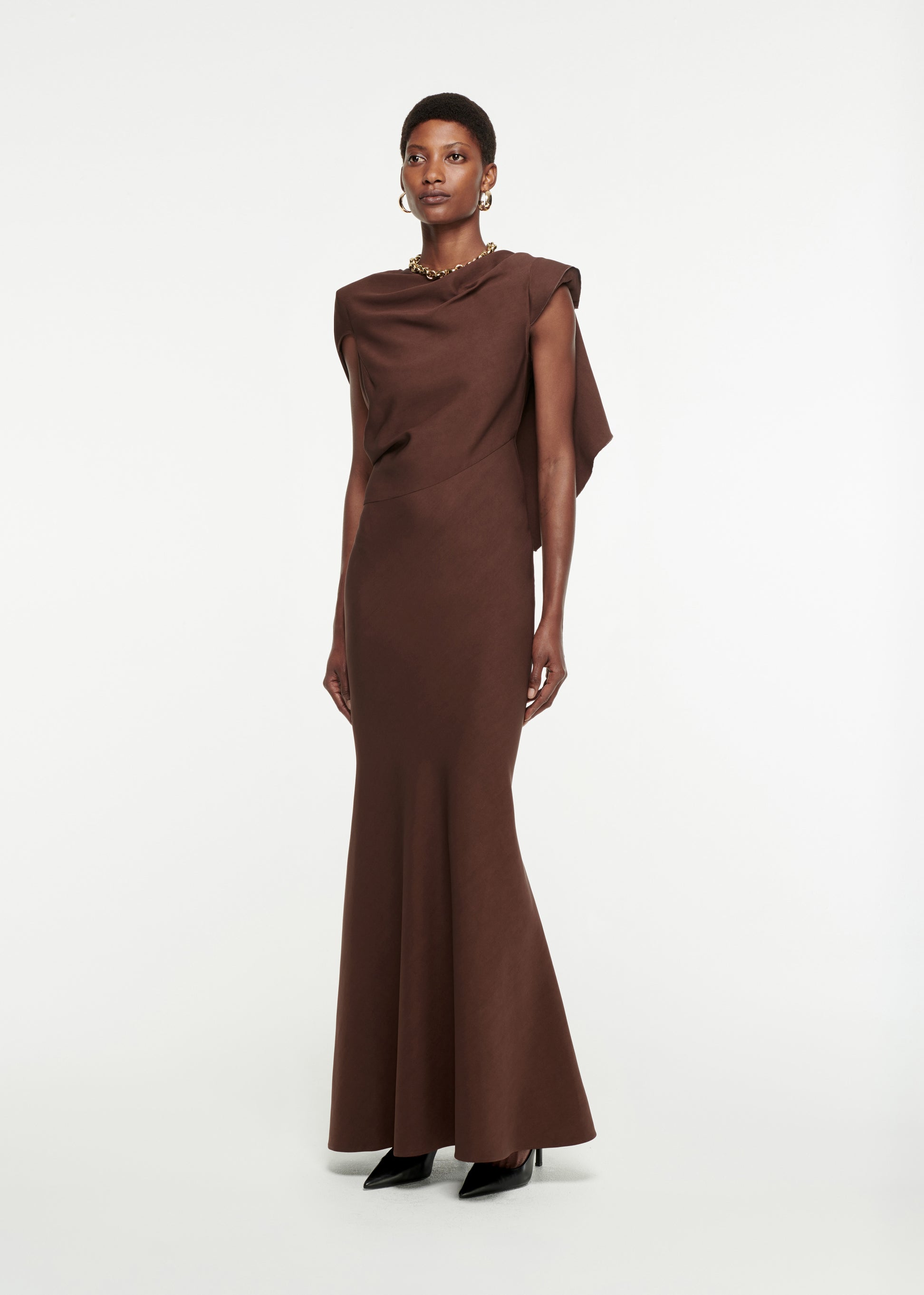 Woman wearing the Draped Stretch-Cady Gown in Brown
