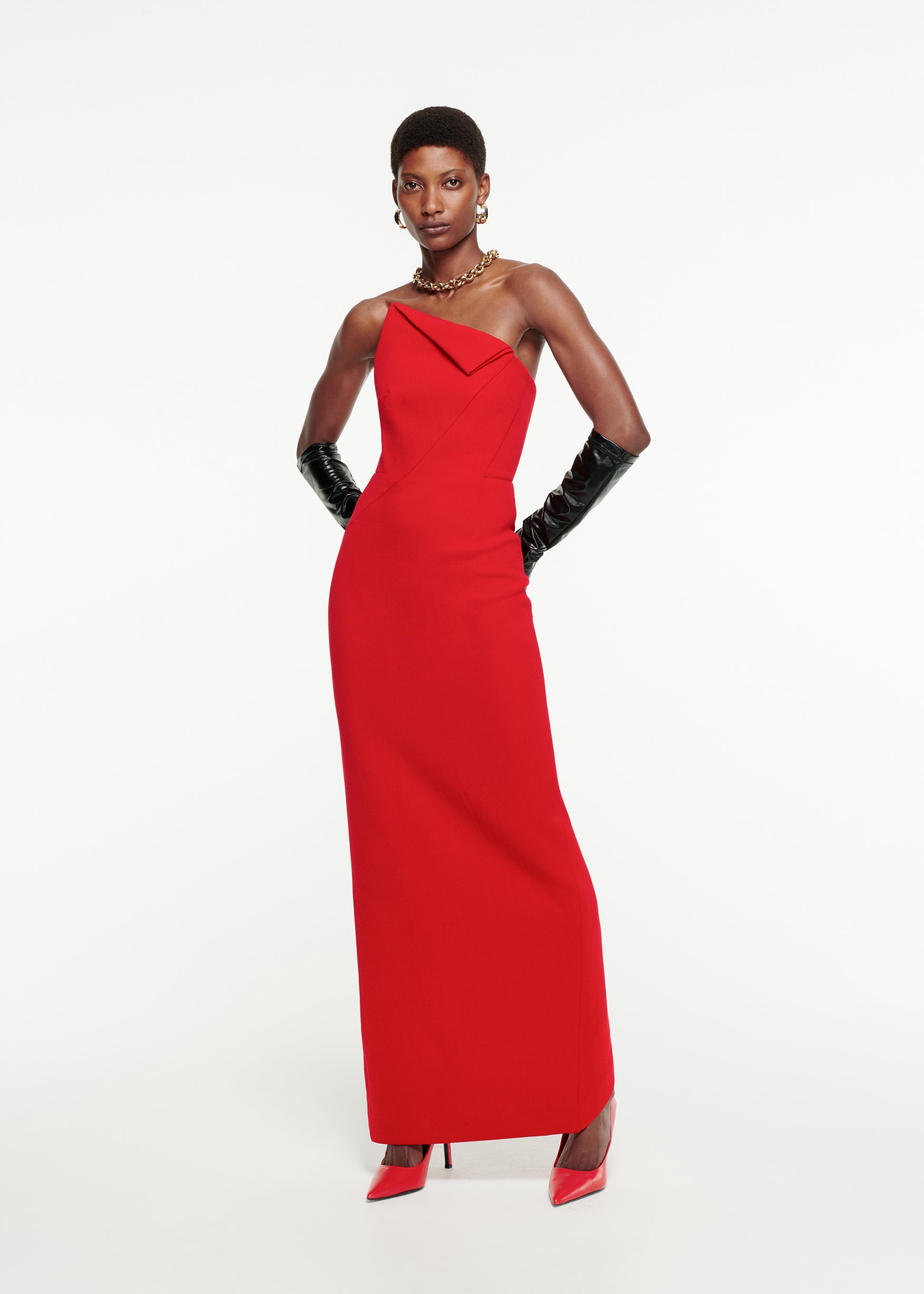 Woman wearing the Strapless Origami Gown in Red 