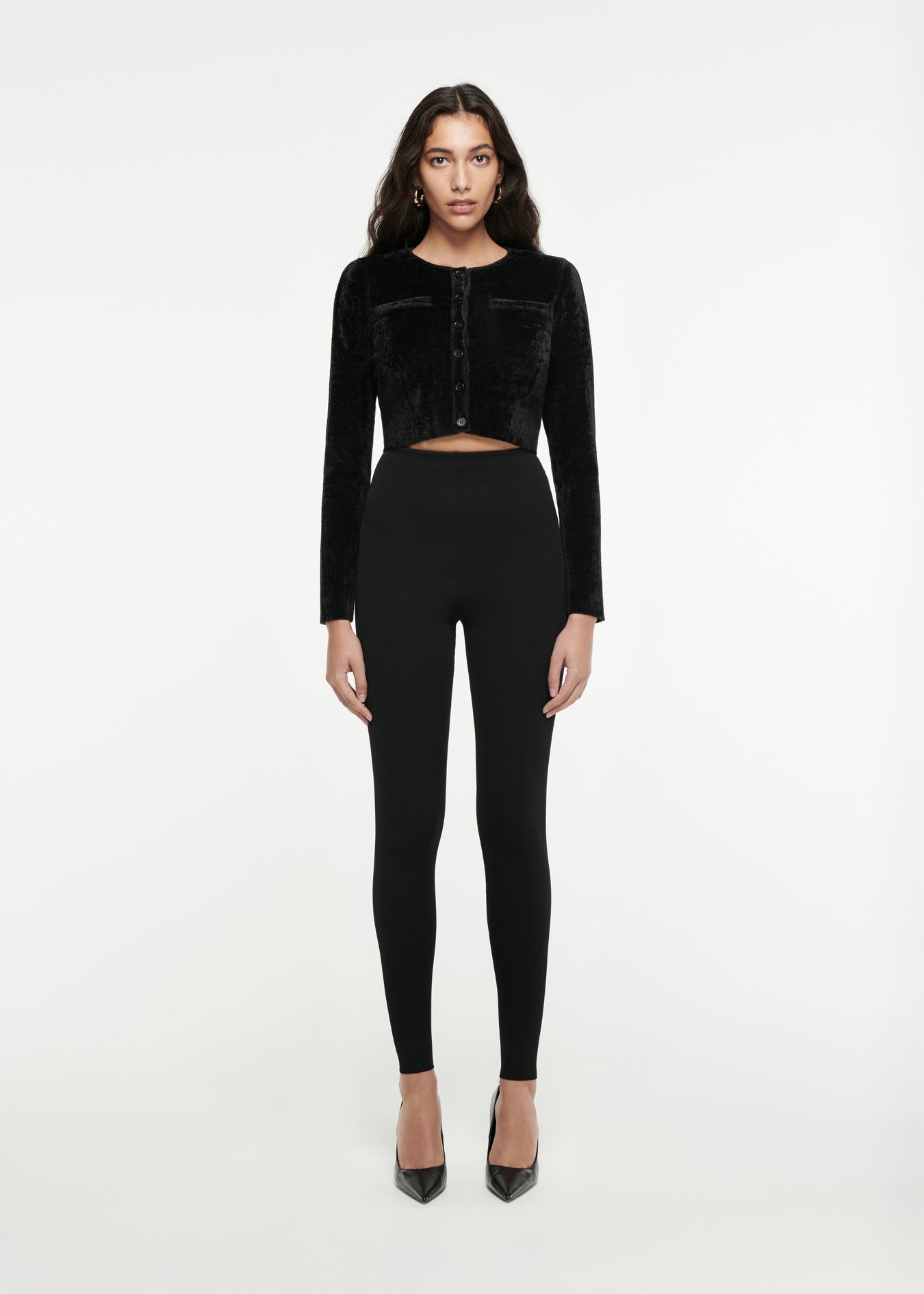 Woman wearing the Cropped Chenille Knit Cardigan in Black