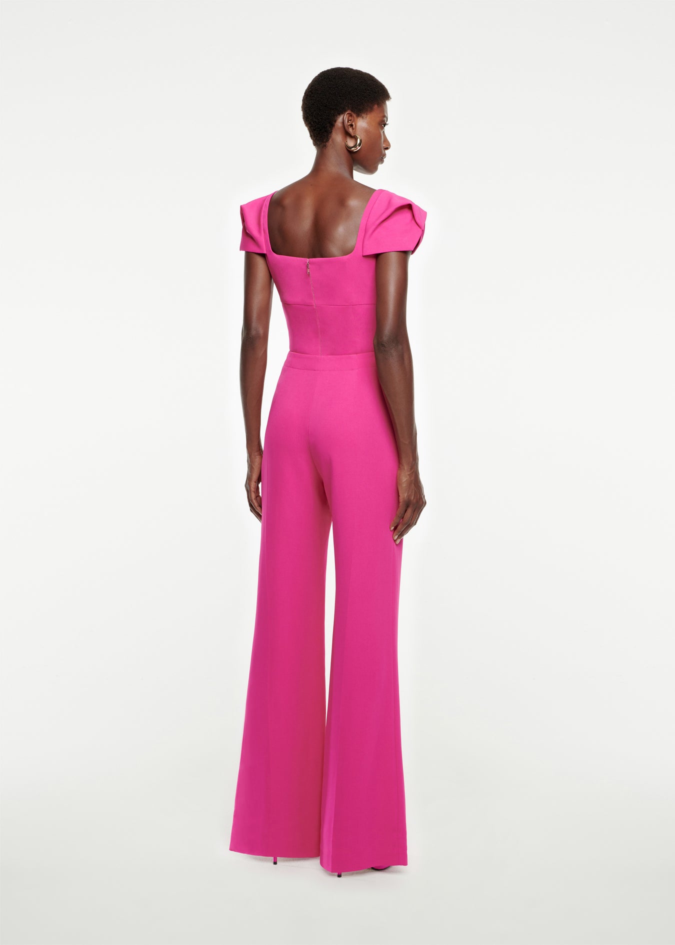 The back of a woman wearing the Wide Leg Stretch-Cady Trouser in Pink