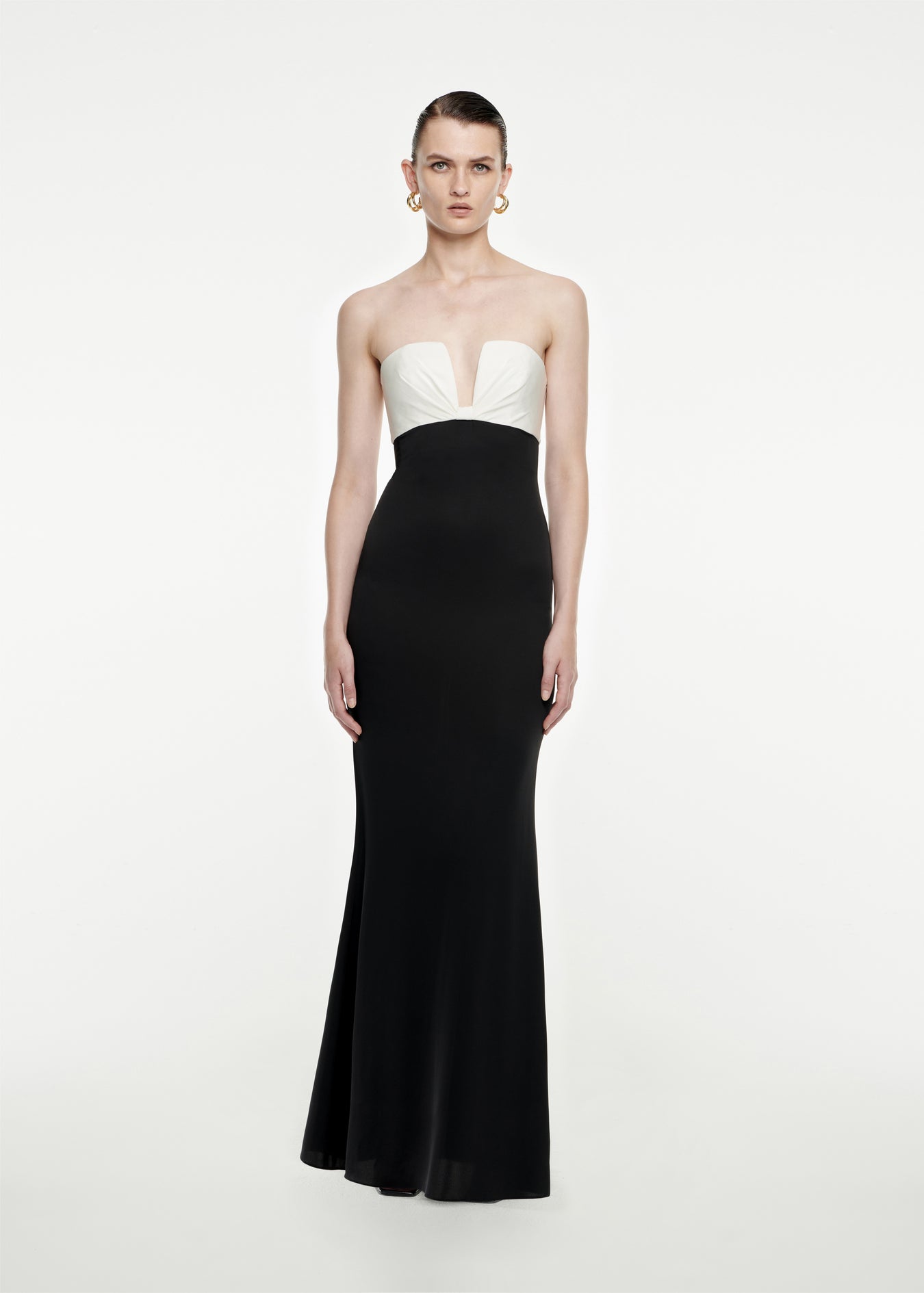 Woman wearing the Strapless Stretch Silk Crepe Maxi Dress in Black
