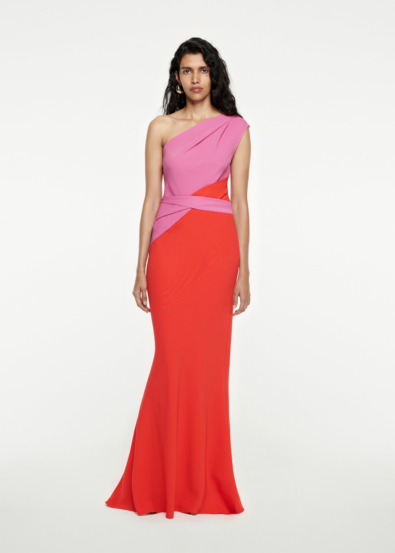 Woman wearing the Asymmetric Stretch-Cady Maxi Dress in Red