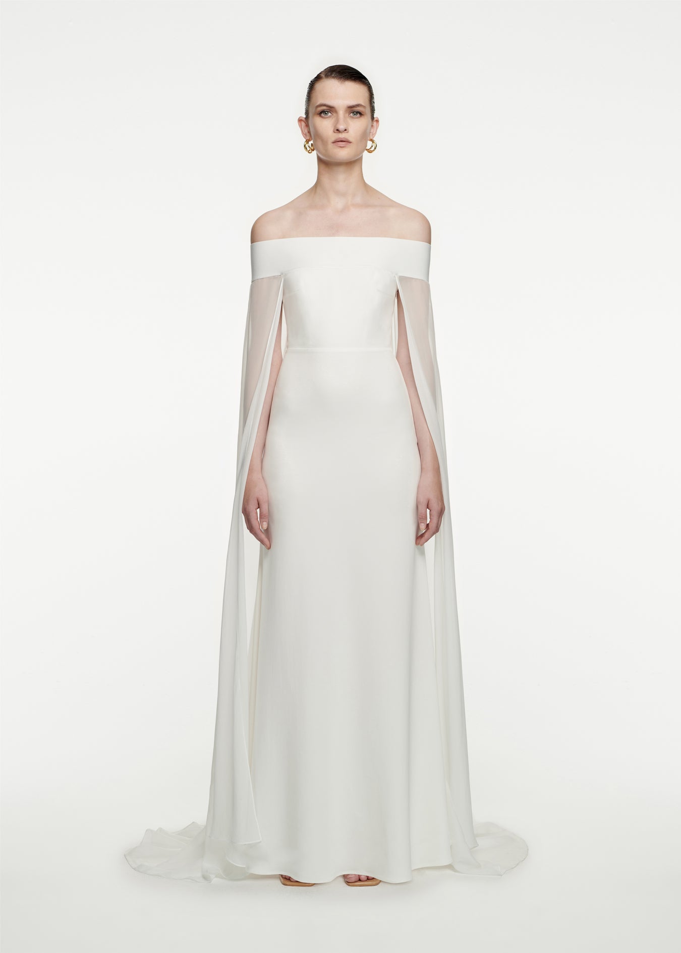 Woman wearing the Off The Shoulder Stretch-Cady Gown in White