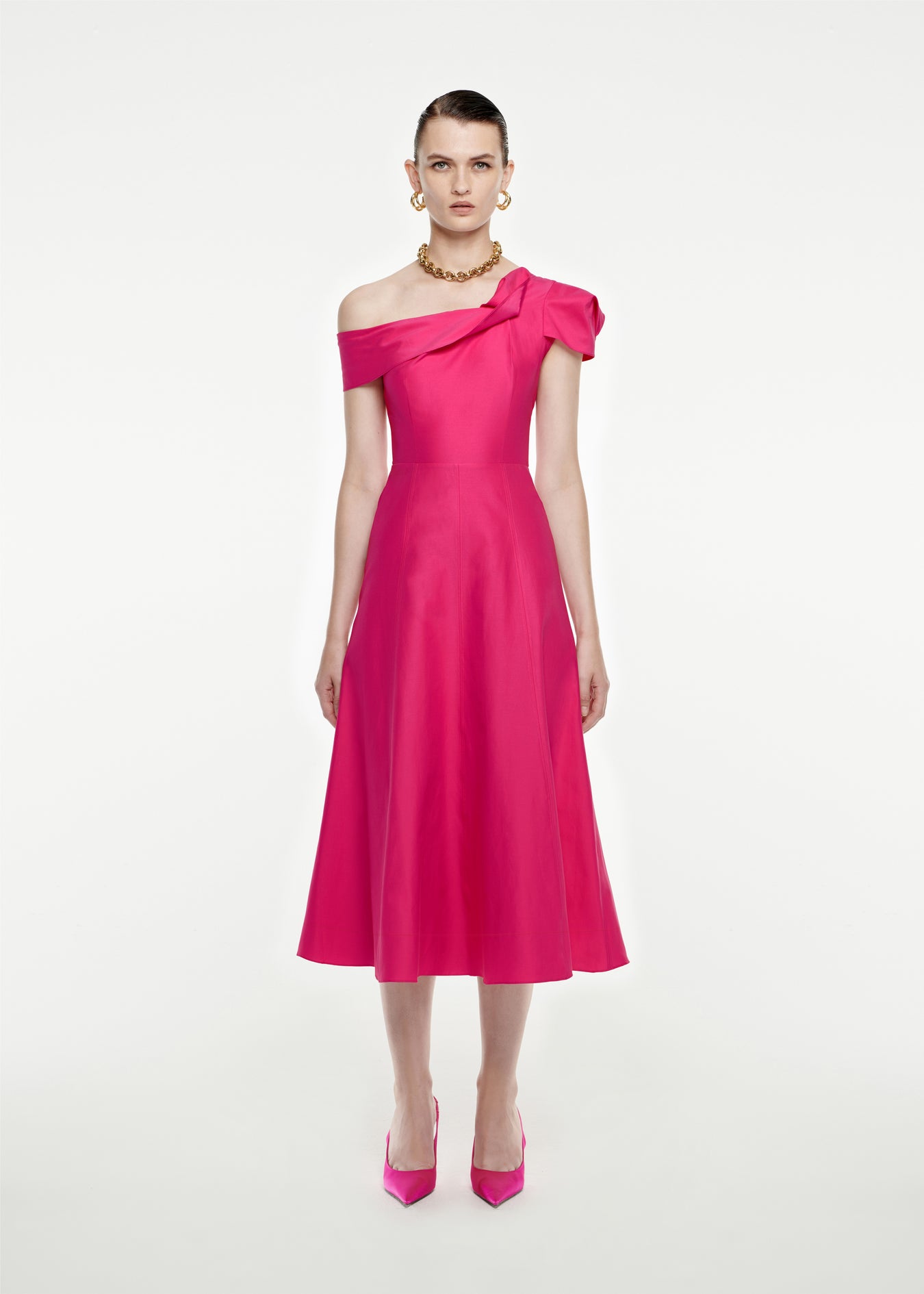 Woman wearing the Asymmetric Cotton Poplin Midi Dress in Pink