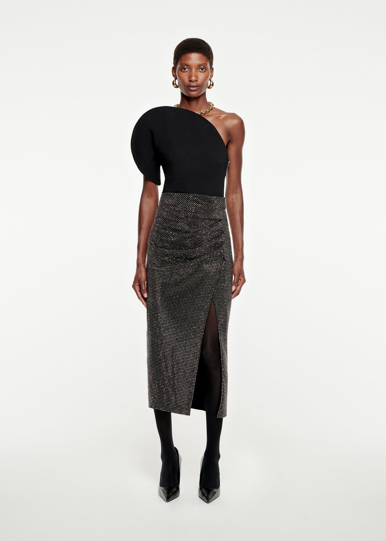 Woman wearing the Diamante Midi Skirt in Black